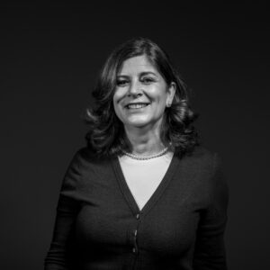 A smiling corporate portrait taken in a studio in Lisbon