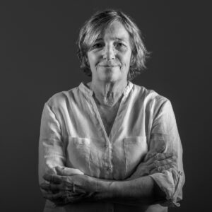 Studio portrait with arms crossed, photographer in Lisbon